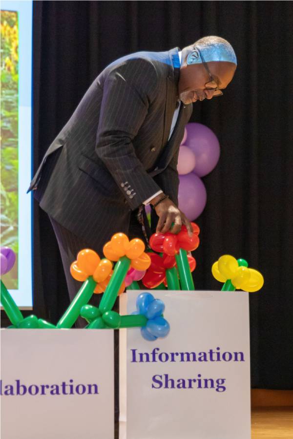President of the hospital planting flowers